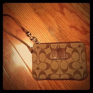 Brown Coach wristlet